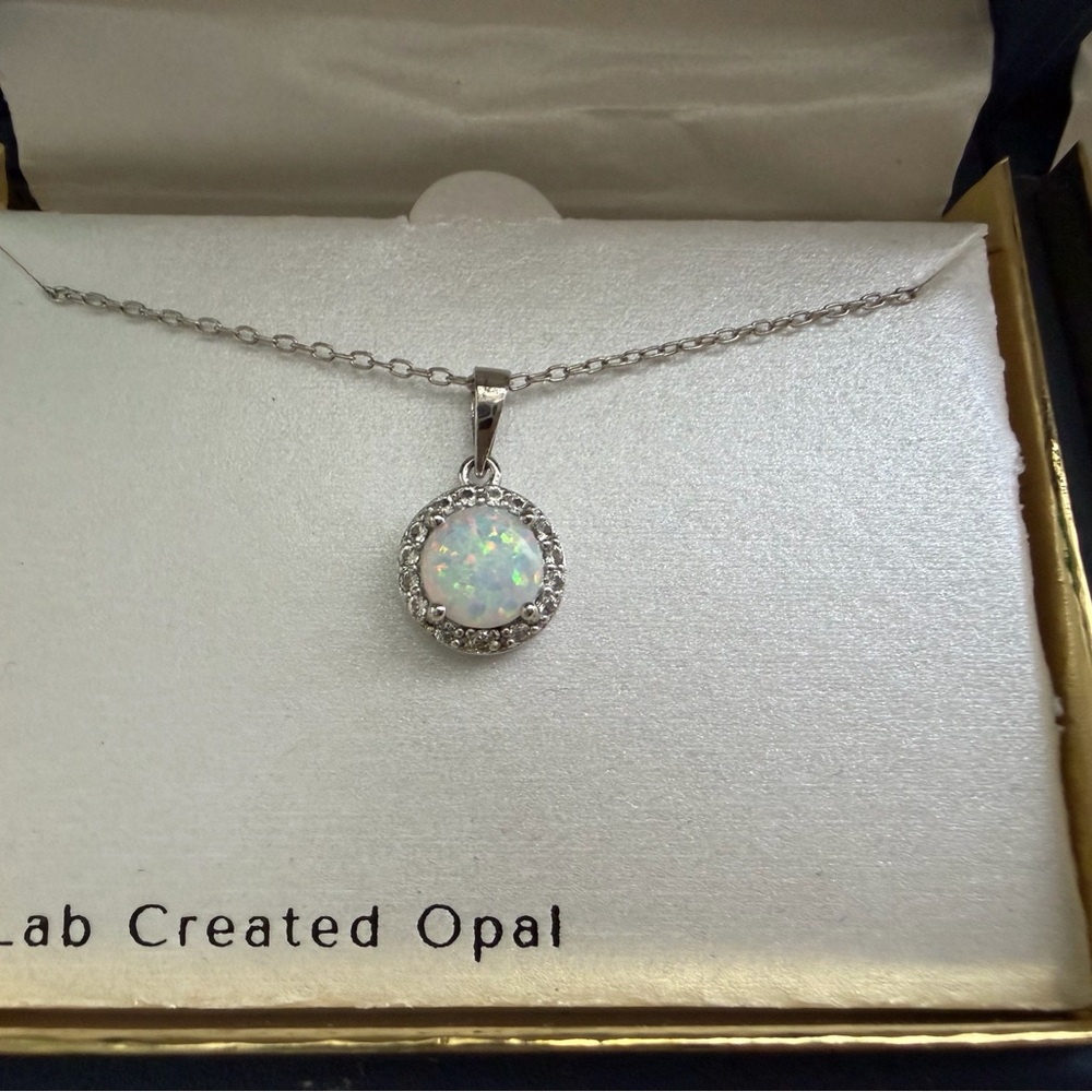 Elegant Silver Opal Pendant Necklace and earrings